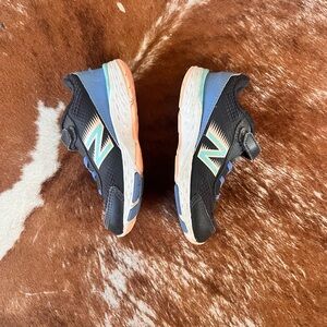 New Balance Kids Black and Blue Sneakers